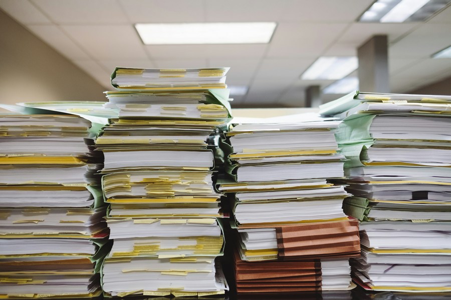 paperwork wesley tingey unsplash